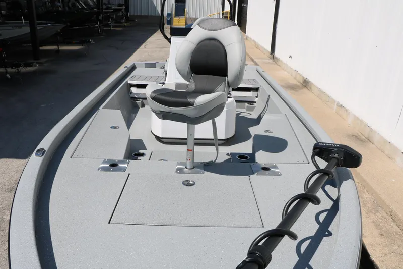 Slide: The Image of 2025 Vexus ACX 2000 boat with seating and Garmin trolling motor on deck. - 13