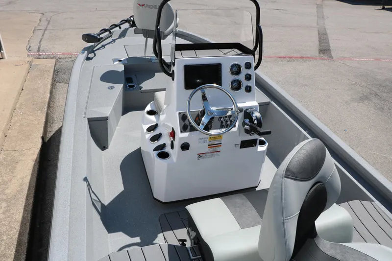 Slide: The Image of 2025 Vexus ACX 2000 boat interior with steering console and seating. - 14