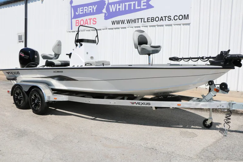 Slide: The Image of 2025 Vexus ACX 2000 boat on trailer at Jerry Whittle Boats dealership. - 3