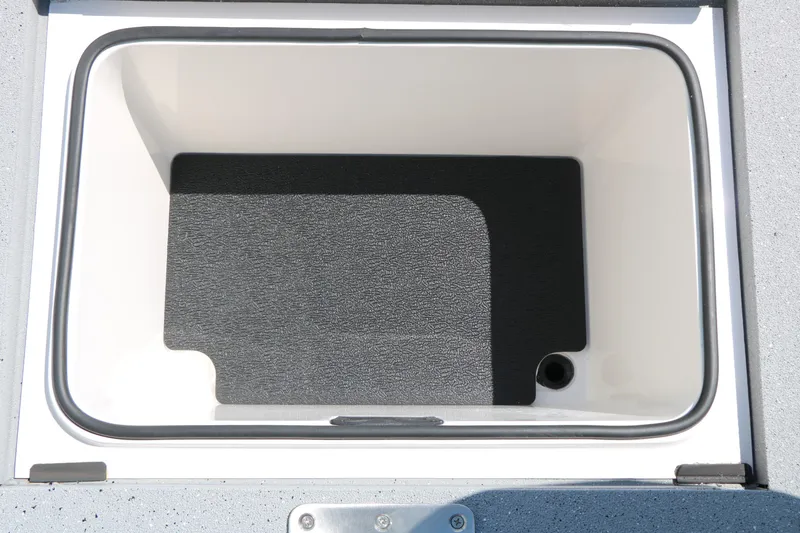 Slide: The Image of Vexus ACX 2000 2025 boat storage compartment with black interior lining. - 33