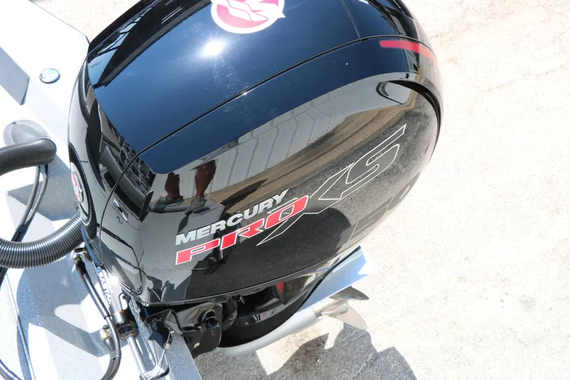 Slide: The Image of Mercury Pro XS outboard motor on 2025 Vexus ACX 2000 boat, close-up view. - 34