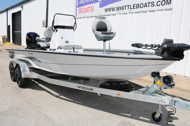 Slide: The Image of 2025 Vexus ACX 2000 boat on trailer, parked outside Whittle Boats dealership. - 4