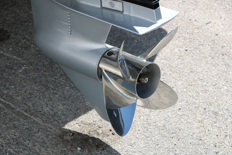 Slide: The Image of Sleek propeller of 2025 Vexus ACX 2000 boat on concrete surface. - 9