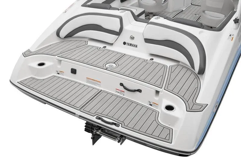 Slide: The Image of 2025 Yamaha Boats 195S swim platform with cushioned seating and sleek design. - 13