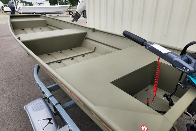 Slide: The Image of 2026 Tracker Grizzly 1436 Utility boat on trailer, featuring a minimalist design. - 7