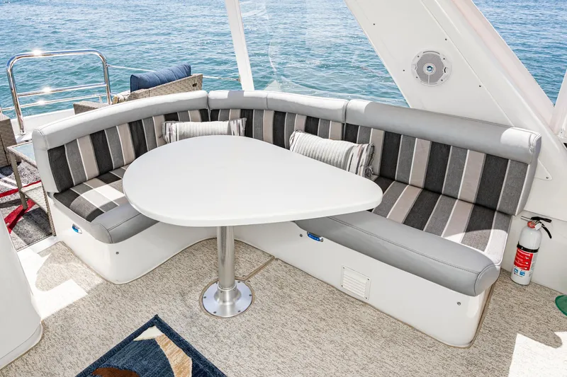 Slide: The Image of Luxurious seating area on a 2006 Navigator 5100 yacht with ocean view. - 21