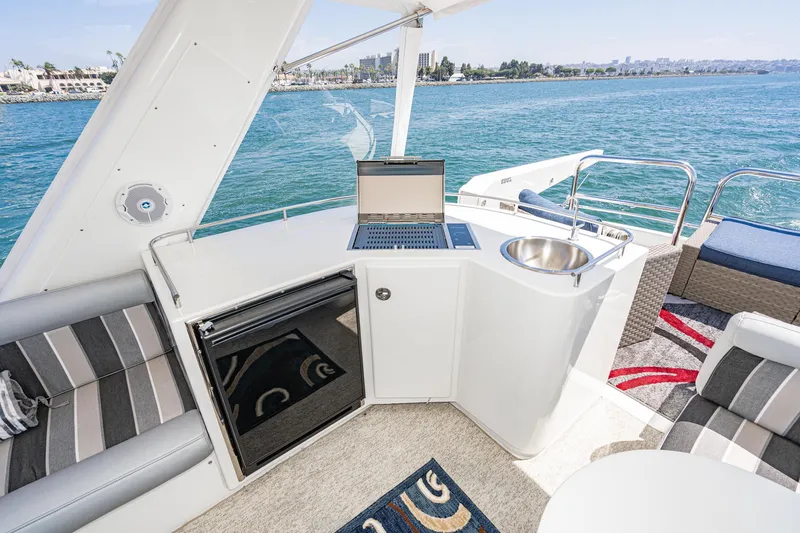 Slide: The Image of Luxurious 2006 Navigator 5100 yacht interior with kitchenette and ocean view. - 23