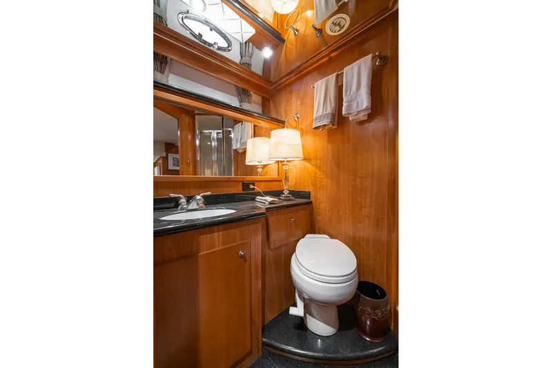 Slide: The Image of Luxurious 2006 Navigator 5100 yacht bathroom with wood paneling and elegant fixtures. - 37