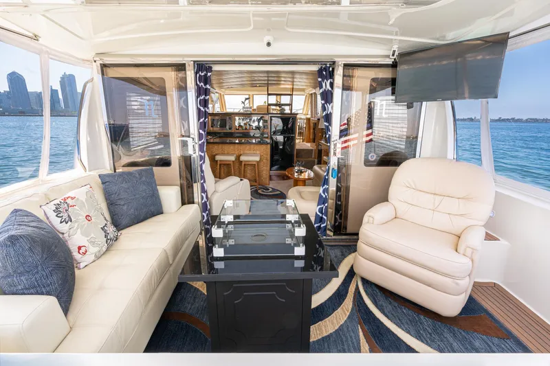 Slide: The Image of Luxurious interior of 2006 Navigator 5100 yacht with elegant seating and ocean view. - 5