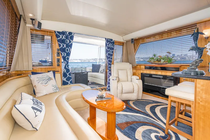 Slide: The Image of Luxurious 2006 Navigator 5100 yacht interior with elegant seating, decor, and scenic ocean view. - 6