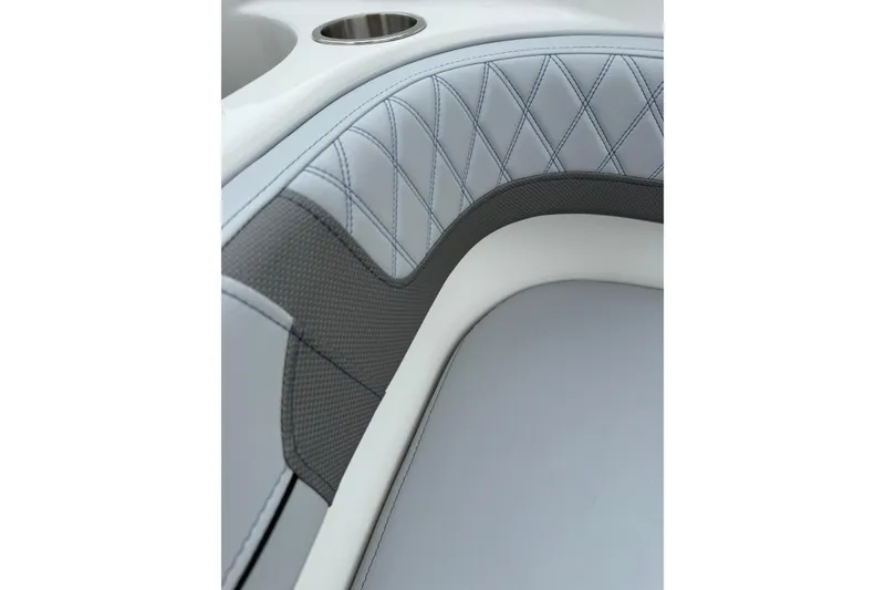 Slide: The Image of Luxurious seating detail of 2026 Bayliner VR6 Bowrider OB with diamond stitching. - 5