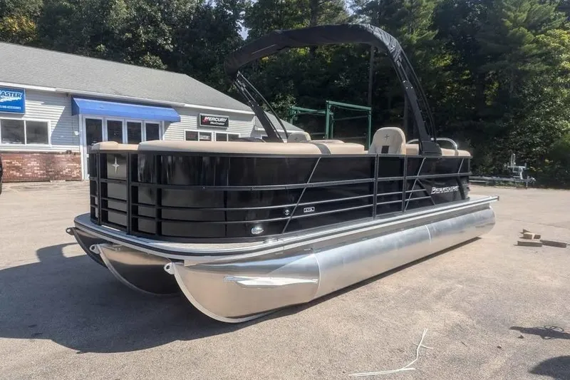 Slide: The Image of 2025 Berkshire 22RFX CTS pontoon boat parked outdoors. - 4