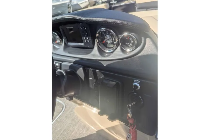 Slide: The Image of Dashboard of 2025 Berkshire 22RFX CTS boat with gauges and controls. - 9