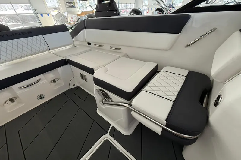 Slide: The Image of 2026 Bayliner D22 boat interior with sleek seating and modern design. - 11