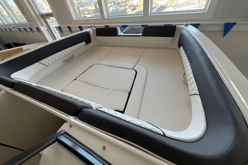 Slide: The Image of 2026 Bayliner D22 boat interior with luxurious seating and modern design. - 6