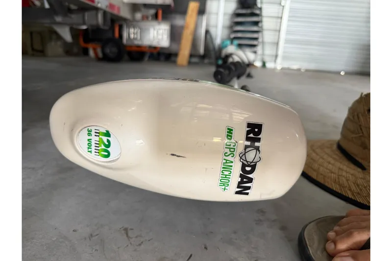 Slide: The Image of Rhodan HD GPS Anchor on 2008 Contender 31 Cuddy boat in garage setting. - 41