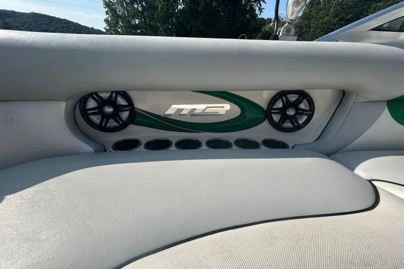 Slide: The Image of Interior of 2011 MB F21 Tomcat boat with speakers and logo detail. - 10