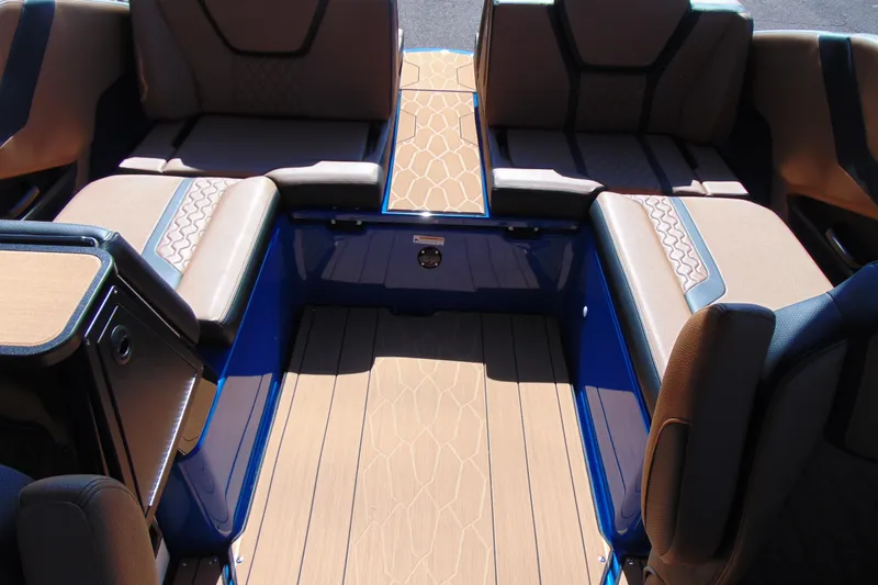 Slide: The Image of 2026 Yamaha Boats 255XD interior with luxurious seating and stylish design. - 10