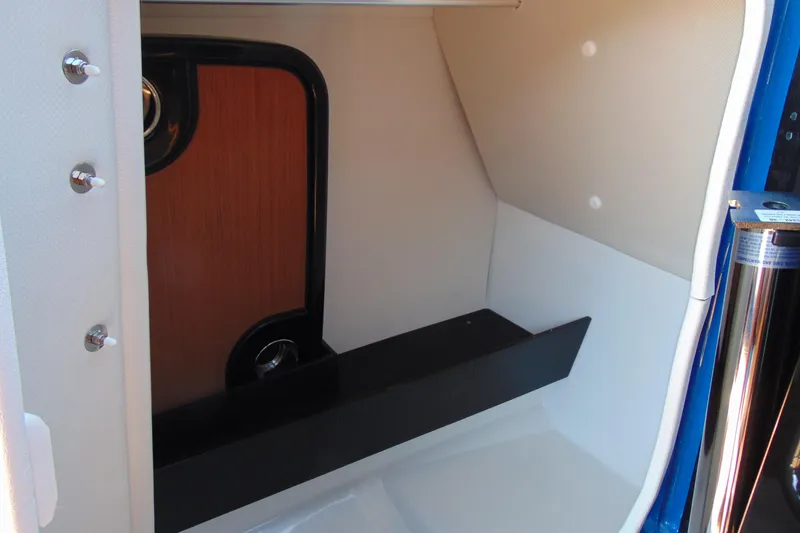 Slide: The Image of Interior cabin of 2026 Yamaha Boats 255XD, featuring sleek design and modern finishes. - 18