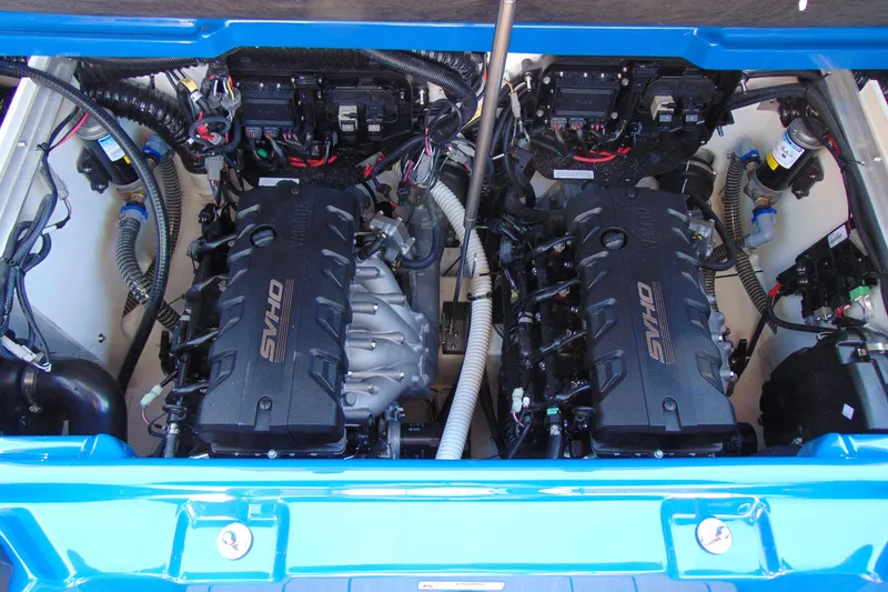 Slide: The Image of Engine compartment of 2026 Yamaha Boats 255XD, featuring dual SVHO engines. - 19