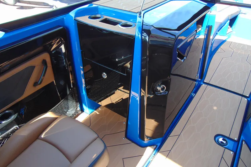 Slide: The Image of Interior of 2026 Yamaha Boats 255XD, featuring sleek design and modern amenities. - 9