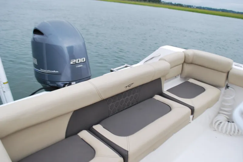 Slide: The Image of 2020 Tidewater 220 LXF boat with Yamaha 200 engine, featuring comfortable seating. - 15