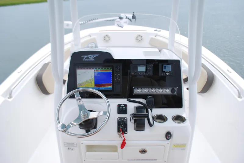 Slide: The Image of Tidewater 220 LXF 2020 boat dashboard with navigation and control systems. - 9