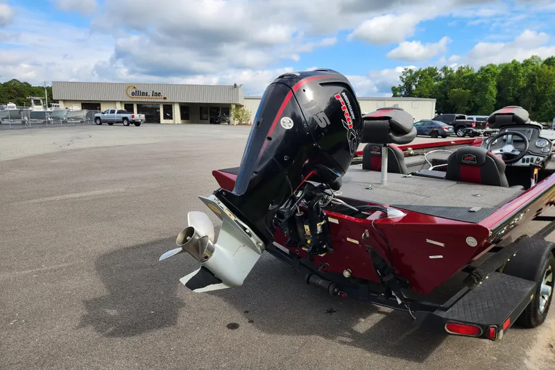 Slide: The Image of 2019 Ranger RT188C boat with outboard motor in parking lot near Collins Inc. building. - 4