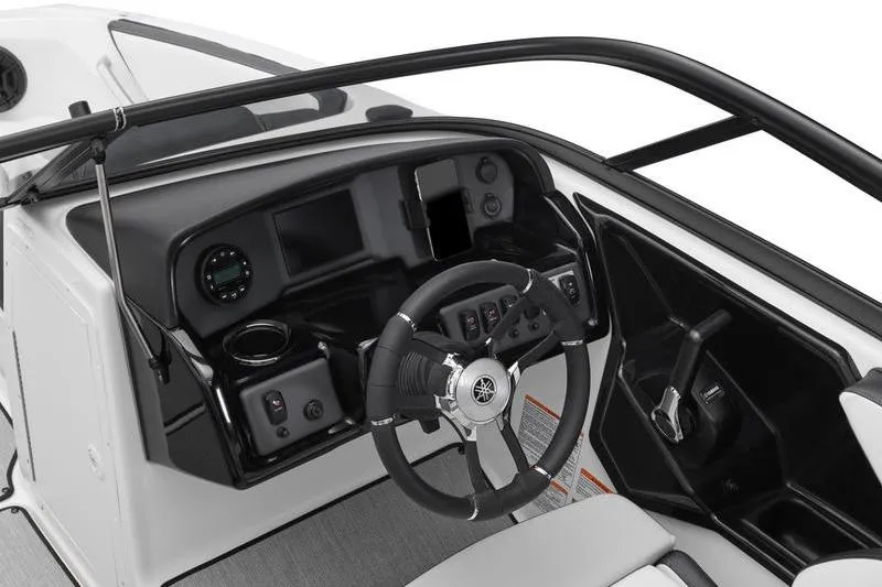 Slide: The Image of 2025 Yamaha Boats AR195 cockpit with steering wheel and control panel. - 5