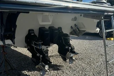 Slide: The Image of 2020 Formula 380 Super Sport Crossover I/O boat stern with dual propellers. - 10