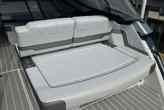 Slide: The Image of 2020 Formula 380 Super Sport Crossover I/O boat with spacious rear seating area. - 13