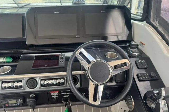 Slide: The Image of Control panel of a 2020 Formula 380 Super Sport Crossover I/O boat. - 28