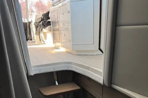 Slide: The Image of Interior view of 2020 Formula 380 Super Sport Crossover I/O boat, featuring sleek cabinetry. - 38