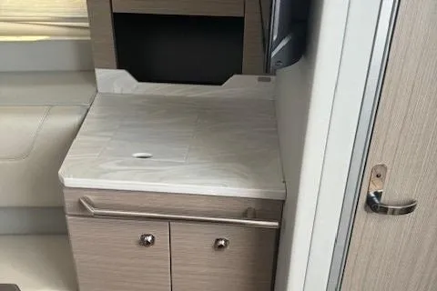 Slide: The Image of 2020 Formula 380 Super Sport Crossover I/O interior with sleek cabinetry and countertop. - 42