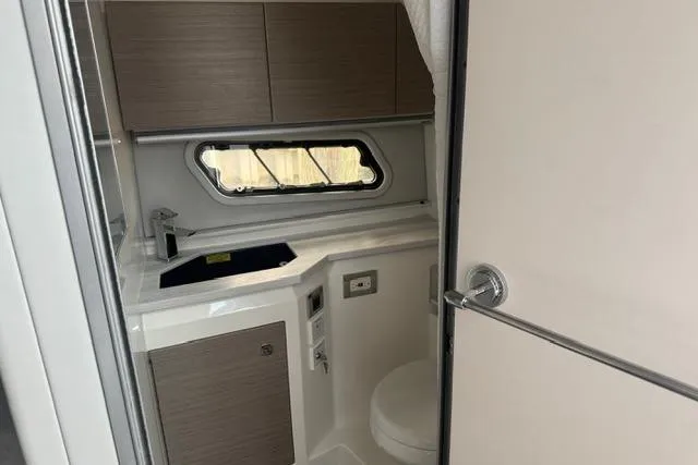 Slide: The Image of Interior of 2020 Formula 380 Super Sport Crossover I/O bathroom with modern fixtures. - 50