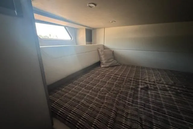 Slide: The Image of Interior cabin of 2020 Formula 380 Super Sport Crossover I/O with bed and window. - 54