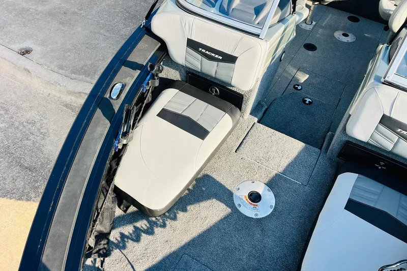 Slide: The Image of 2018 Tracker Targa V-19 Combo 40th Anniversary Edition boat interior with seating and storage. - 15