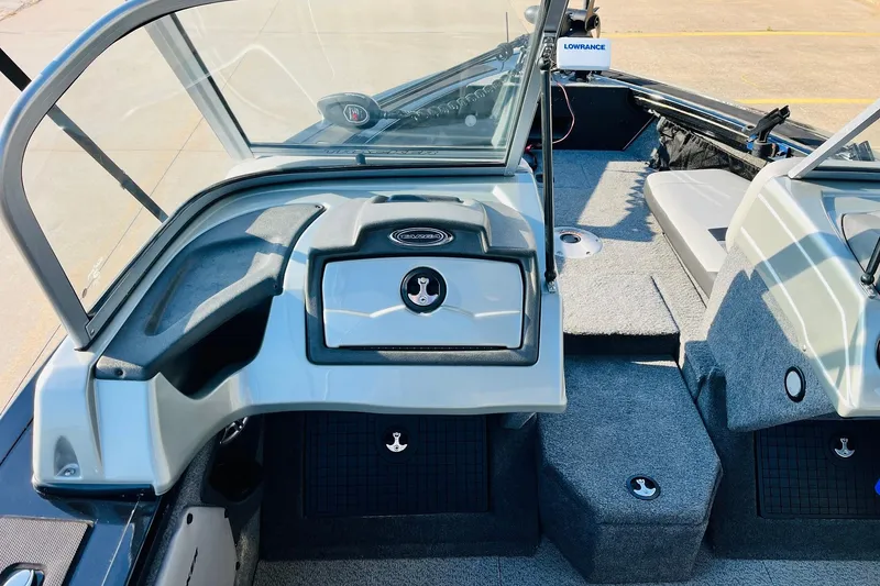 Slide: The Image of 2018 Tracker Targa V-19 Combo 40th Anniversary Edition boat interior with windshield and seating. - 27
