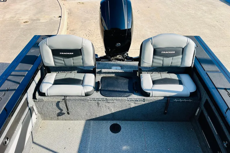 Slide: The Image of 2018 Tracker Targa V-19 Combo boat interior with two cushioned seats. - 39