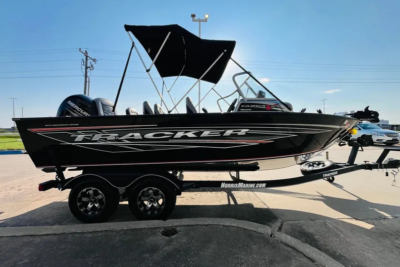 Slide: The Image of 2018 Tracker Targa V-19 Combo 40th Anniversary Edition boat on trailer, side view. - 4