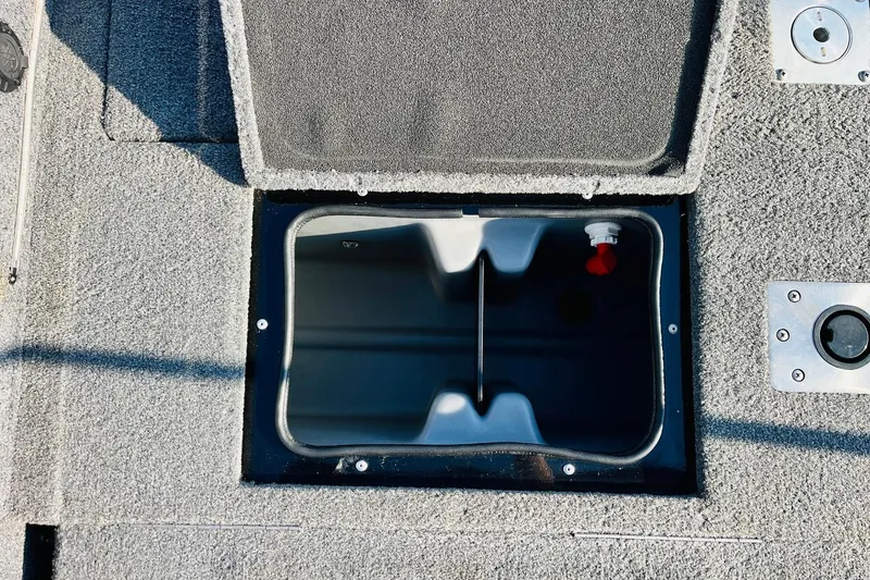 Slide: The Image of Open storage compartment on 2018 Tracker Targa V-19 Combo boat, 40th Anniversary Edition. - 44