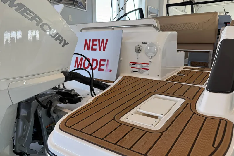 Slide: The Image of 2025 Bayliner Trophy T22SC boat with Mercury engine, showcasing new model features. - 6