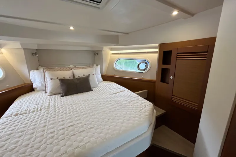 Slide: The Image of Luxurious bedroom in 2026 Beneteau 41 Swift Trawler Sedan yacht. - 26