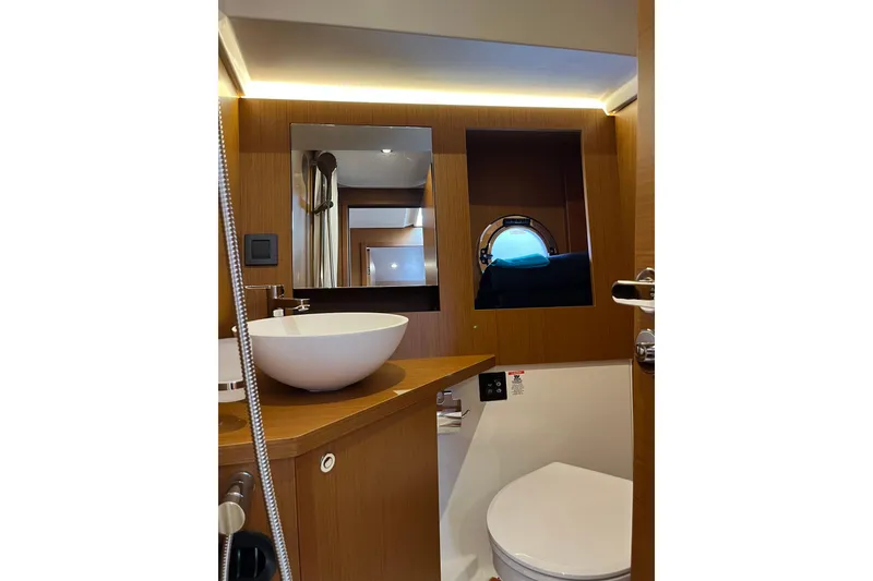 Slide: The Image of Bathroom interior of 2026 Beneteau 41 Swift Trawler Sedan with modern fixtures. - 33