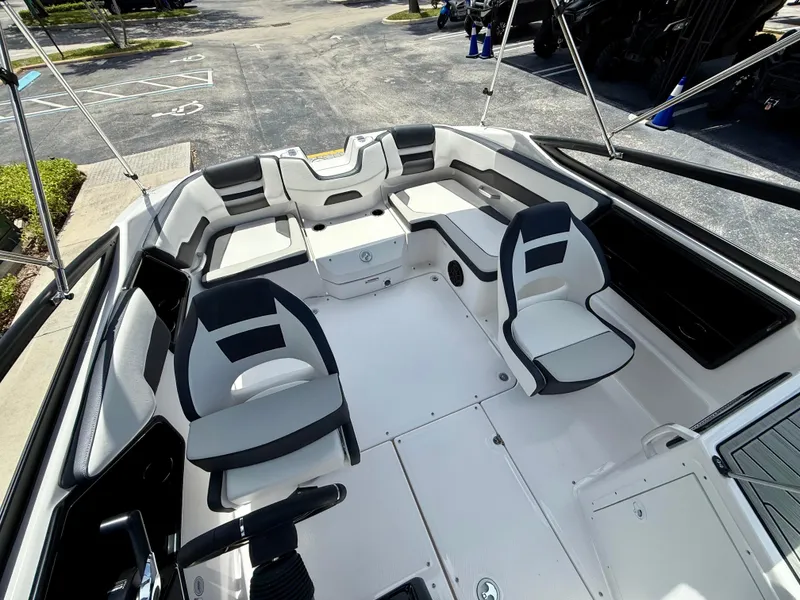 Slide: The Image of 2025 Yamaha Boats SX195 interior with modern seating and spacious layout. - 5