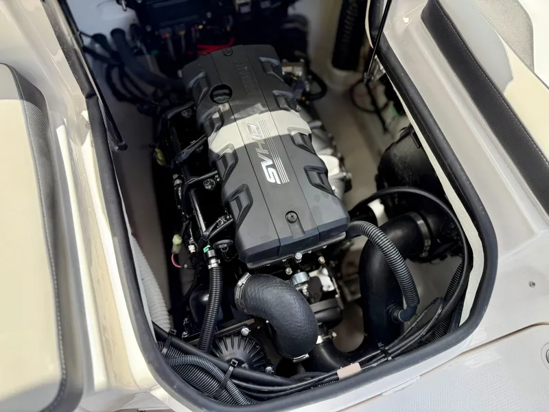 Slide: The Image of 2025 Yamaha Boats SX195 engine compartment showcasing powerful SVHO engine. - 9