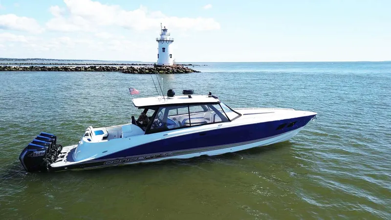 Slide: The Image of 2020 Concept 44' Cuddy Cabin boat near lighthouse on calm sea. - 1