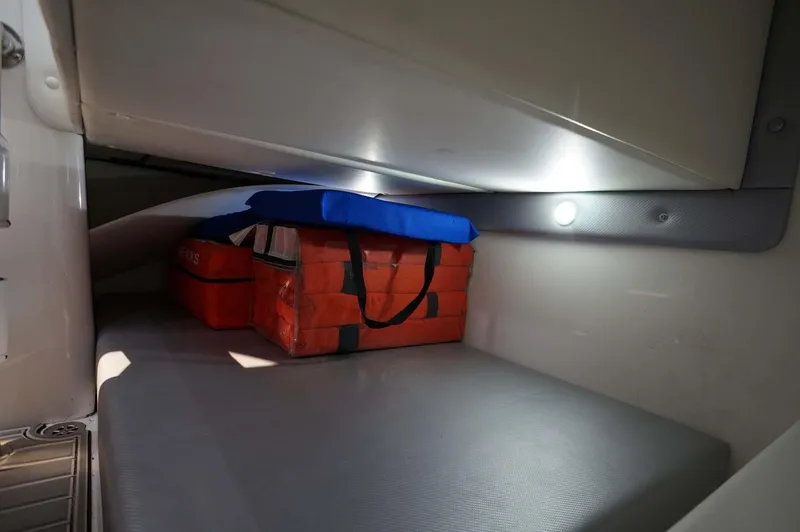 Slide: The Image of 2020 Concept 44' Cuddy Cabin interior with storage area and life jackets. - 14