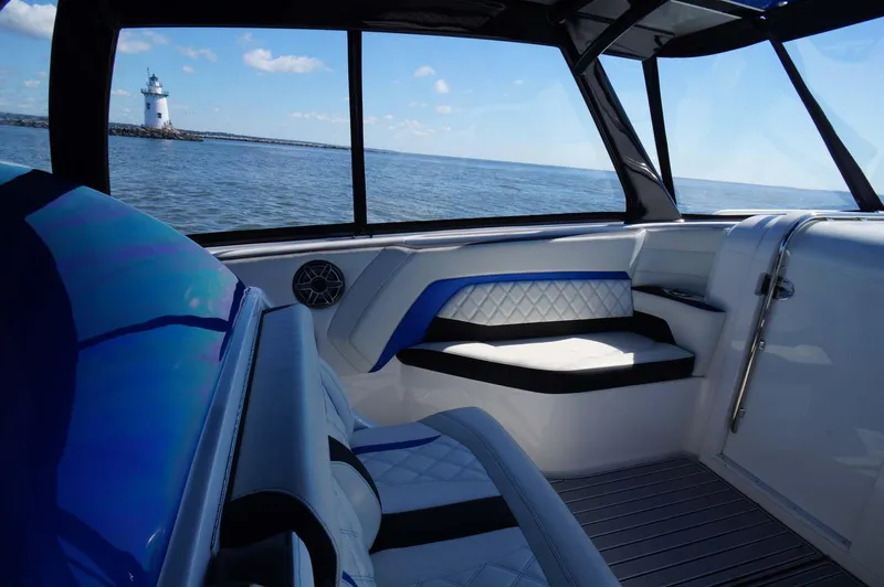 Slide: The Image of Interior of 2020 Concept 44' Cuddy Cabin boat with ocean view and lighthouse. - 21