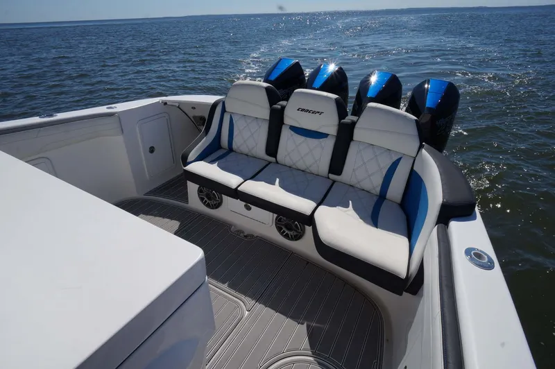 Slide: The Image of 2020 Concept 44' Cuddy Cabin boat with luxurious seating on open water. - 23